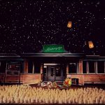 Digitalt gjord bild på Risbergska skolan med ljus framför och stjärnhimel bakom.