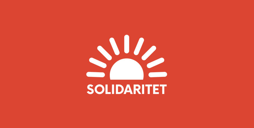 Bild på Solidaritets vita logga, en halv sol, samt röd bakgrund.